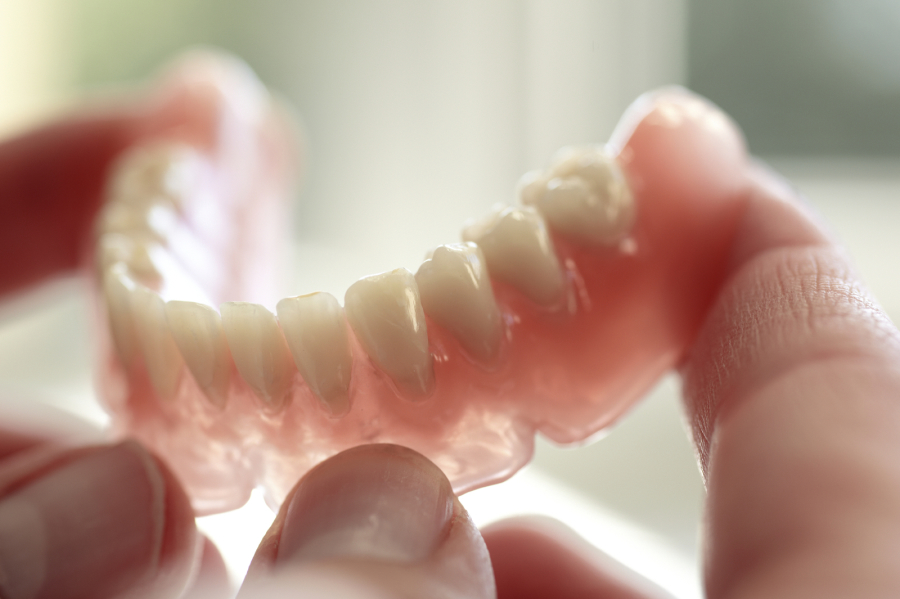 Should You Get Dental Implants or Dentures in Upland, CA?